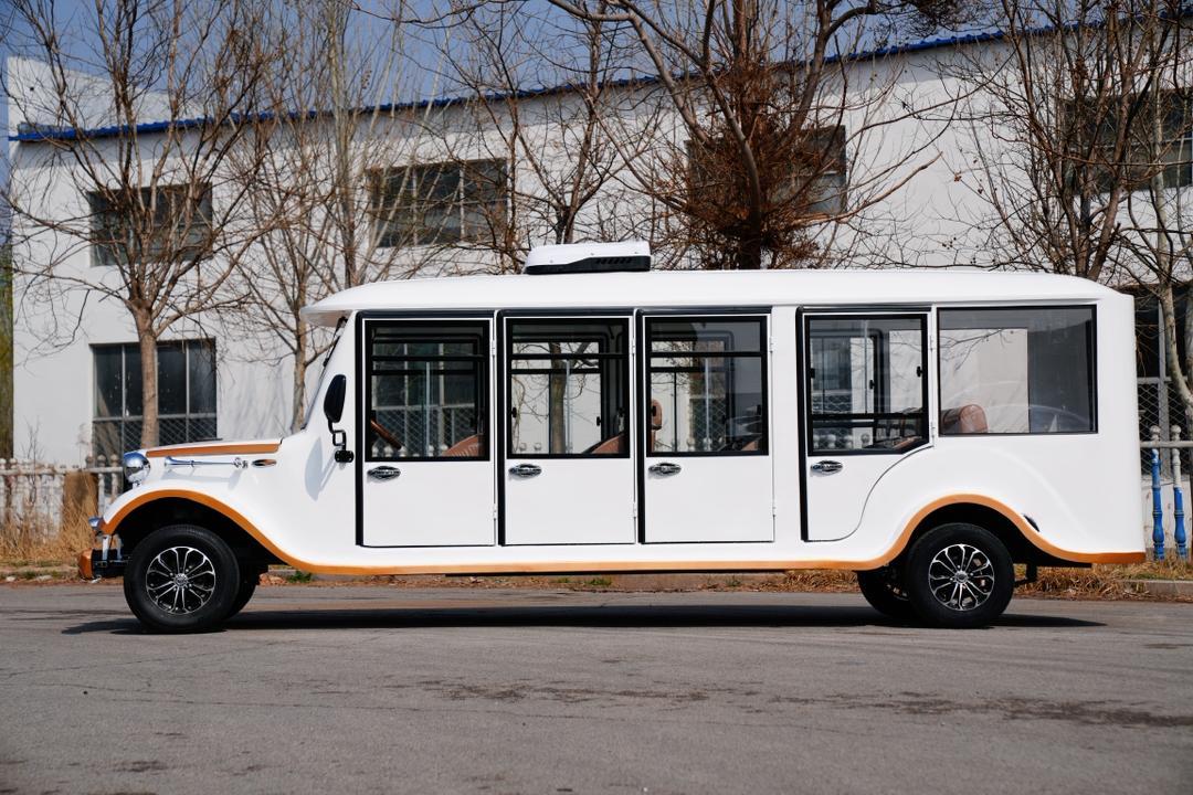 Classic tourist vehicle — white vintage side view