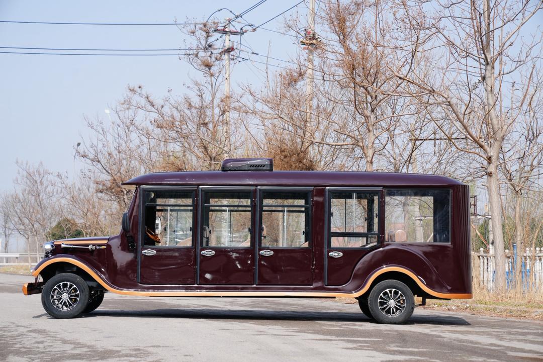 Classic tourist vehicle — burgundy vintage bus