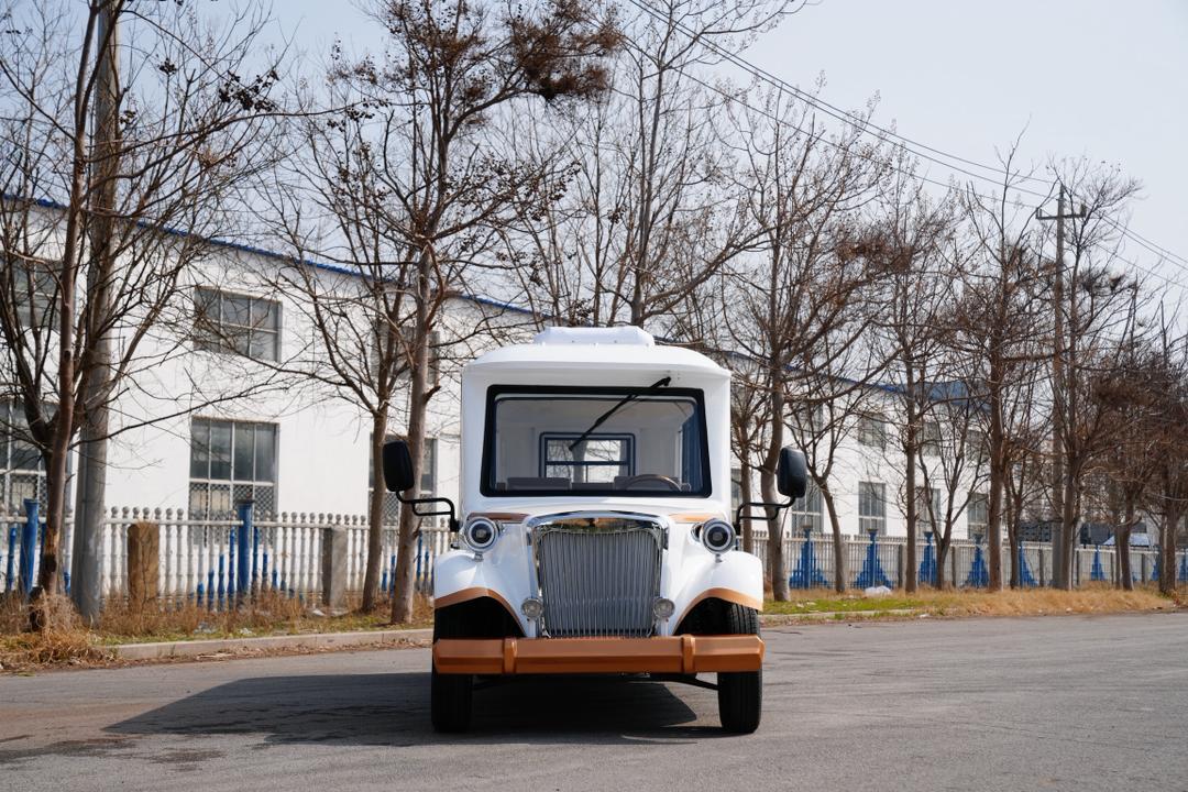 Classic tourist vehicle — compact white vintage